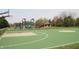A colorful playground and basketball court offer recreational opportunities for the community at 10235 Normandy Way, Fishers, IN 46040