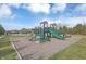 Community playground with slides, climbers, and ample space for children to play at 10235 Normandy Way, Fishers, IN 46040