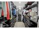 A large walk-in closet with shelving and hanging racks for organized storage and plenty of clothing at 10235 Normandy Way, Fishers, IN 46040