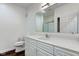 Bright bathroom featuring a large vanity and a toilet at 1200 Shadow Ridge Rd, Carmel, IN 46280