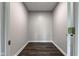 Walk-in closet with wood-look flooring and freshly painted walls at 1200 Shadow Ridge Rd, Carmel, IN 46280