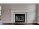 Elegant fireplace with white mantel and decorative tile surround, perfect for cozy evenings at 1200 Shadow Ridge Rd, Carmel, IN 46280