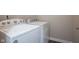 Laundry room with white washer and dryer at 1200 Shadow Ridge Rd, Carmel, IN 46280
