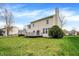 This home features a spacious lawn and a small deck that offers relaxation at 12027 Sellerton Dr, Fishers, IN 46037