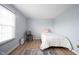 Bright bedroom with ample natural light, neutral walls, and modern accents offers a peaceful retreat at 12516 Schoolhouse Rd, Fishers, IN 46037