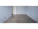 Neutral toned bedroom showcasing durable wood-look laminate flooring at 12516 Schoolhouse Rd, Fishers, IN 46037