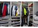 Organized walk-in closet featuring custom shelving, drawers, and ample space for clothing and accessories at 12516 Schoolhouse Rd, Fishers, IN 46037