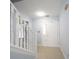 Bright foyer features tile flooring, a white staircase, and a white front door with glass panels at 12516 Schoolhouse Rd, Fishers, IN 46037