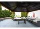 Inviting covered outdoor patio perfect for entertaining and relaxation at 12516 Schoolhouse Rd, Fishers, IN 46037