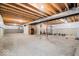 Unfinished basement with exposed wood beams and an open layout perfect for customization at 12598 Coastal Pl, Fishers, IN 46037