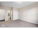 Bedroom with neutral walls and carpet with access to a full bathroom at 12598 Coastal Pl, Fishers, IN 46037