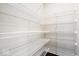 Walk-in pantry featuring adjustable wire shelving for optimal storage at 12598 Coastal Pl, Fishers, IN 46037