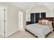 Cozy bedroom with cathedral ceilings features neutral colors and carpeted floors at 13758 Foxdale Lake Dr, Carmel, IN 46032