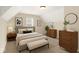 Cozy bedroom features neutral tones, natural light, and stylish furnishings at 13758 Foxdale Lake Dr, Carmel, IN 46032