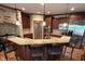 Beautiful kitchen showcasing granite countertops, stainless steel appliances, and brick accents at 13758 Foxdale Lake Dr, Carmel, IN 46032