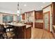 Gourmet kitchen with granite countertops, custom cabinets and stainless steel appliances at 13758 Foxdale Lake Dr, Carmel, IN 46032