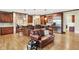 Spacious kitchen with stainless steel appliances, breakfast bar, and hardwood floors at 13758 Foxdale Lake Dr, Carmel, IN 46032