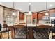 Well-appointed kitchen with stainless steel appliances, granite countertops, and bar seating at 13758 Foxdale Lake Dr, Carmel, IN 46032