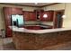 The kitchen features updated cabinetry and stainless appliances. Additional seating at the counter at 13758 Foxdale Lake Dr, Carmel, IN 46032
