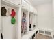 Well-organized mudroom featuring built-in storage and bench seating at 13758 Foxdale Lake Dr, Carmel, IN 46032
