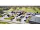 Aerial view of a golf club, with a parking lot, clubhouse and lush green fairways, perfect for golfers at 138 Fairway Dr, Indianapolis, IN 46260