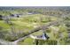 Aerial view of the home near a lush golf course, showcasing its great location and beautiful surroundings at 138 Fairway Dr, Indianapolis, IN 46260
