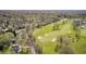 The home is near a lush golf course with stunning green landscapes and mature trees, perfect for golf enthusiasts at 138 Fairway Dr, Indianapolis, IN 46260