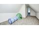 Bright bedroom with sloped ceiling and soft carpet, great storage and play area at 138 Fairway Dr, Indianapolis, IN 46260