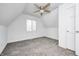 Cozy bedroom features neutral tones, a modern ceiling fan, and natural light from the window at 138 Fairway Dr, Indianapolis, IN 46260