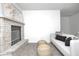 Inviting living room with a brick fireplace and comfortable seating at 138 Fairway Dr, Indianapolis, IN 46260