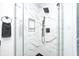 Modern tiled shower featuring black fixtures and a convenient built-in niche at 138 Fairway Dr, Indianapolis, IN 46260