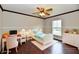Cozy bedroom featuring stylish furniture, hardwood flooring and bright window at 13858 Meadow Lake Dr, Fishers, IN 46038