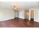 Spacious bedroom with hardwood flooring and attached walk-in closet and bathroom at 13858 Meadow Lake Dr, Fishers, IN 46038