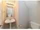 Powder room featuring a pedestal sink at 13858 Meadow Lake Dr, Fishers, IN 46038