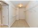 Well-lit, walk-in closet with adjustable shelving and storage space at 13858 Meadow Lake Dr, Fishers, IN 46038
