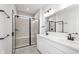 A luxurious bathroom features a double vanity and a tiled shower with glass doors at 14533 Hanford Ln, Carmel, IN 46074