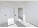 Carpeted bedroom features convenient closet and bathroom access enhancing comfort at 14533 Hanford Ln, Carmel, IN 46074