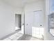Bright bedroom with sliding closet doors, plush carpet, and exterior window at 14551 Hanford Ln, Carmel, IN 46074