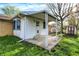 Inviting back porch of a charming home, perfect for outdoor relaxation and enjoying the serene surroundings at 1457 Biloxi Ln, Beech Grove, IN 46107