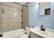 Modern bathroom with sleek fixtures, tiled shower, and updated vanity offers a spa-like experience at 1457 Biloxi Ln, Beech Grove, IN 46107