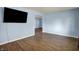 Spacious living room with modern flooring offers seamless transition to other areas of the home at 1457 Biloxi Ln, Beech Grove, IN 46107