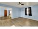 Bright and open living area featuring newer floors, neutral paint and lots of natural light at 1457 Biloxi Ln, Beech Grove, IN 46107