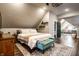 Bedroom boasts a comfortable bed, a stylish rug, and plenty of natural light at 1626 S Delaware St, Indianapolis, IN 46225