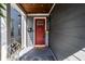 Inviting front porch featuring stylish décor and a cozy seating area at 1626 S Delaware St, Indianapolis, IN 46225