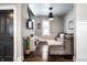 Cozy living room with comfortable seating, stylish decor, and a staircase leading to upper floors at 1626 S Delaware St, Indianapolis, IN 46225