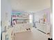 Bright, colorful bedroom with bunk beds, white dresser, and natural light from the window at 16994 Folly Brook Rd, Noblesville, IN 46060