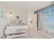 Comfortable bedroom with beach themed wall and bright light at 16994 Folly Brook Rd, Noblesville, IN 46060