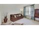 Comfortable living room with large window and plush sofa at 16994 Folly Brook Rd, Noblesville, IN 46060