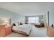 Spacious main bedroom with large bed, sitting area, and natural light at 16994 Folly Brook Rd, Noblesville, IN 46060