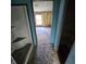 Hallway with destroyed walls and floor at 1704 E Kirk St, Muncie, IN 47303